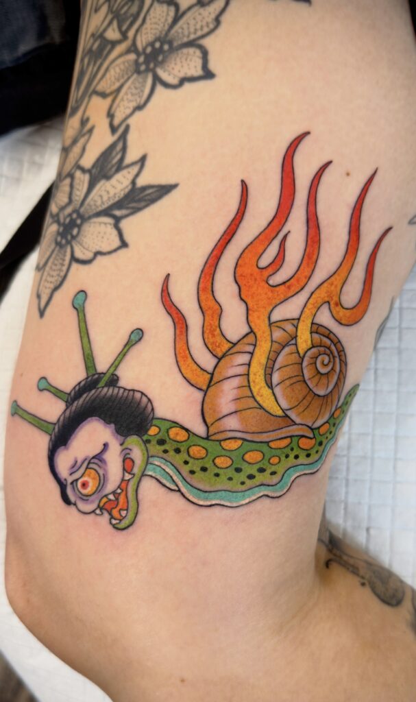 Japanese yokai snail tattoo flames bright color