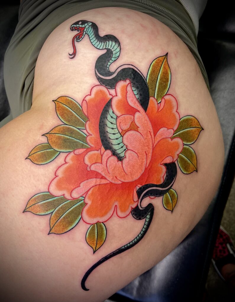 Snake flower peony hip thigh tattoo