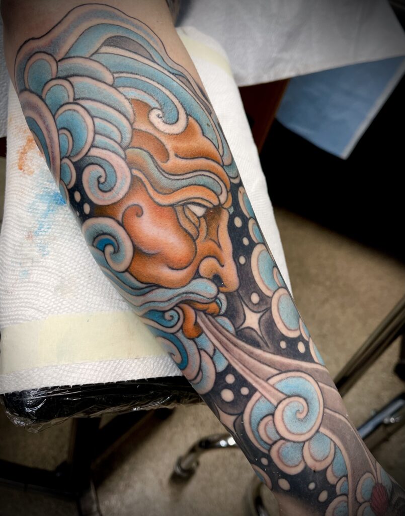 Wind god tattoo comic neotraditional color