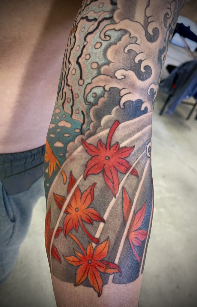 Japanese style sleeve tattoo traditional background maple leaves color