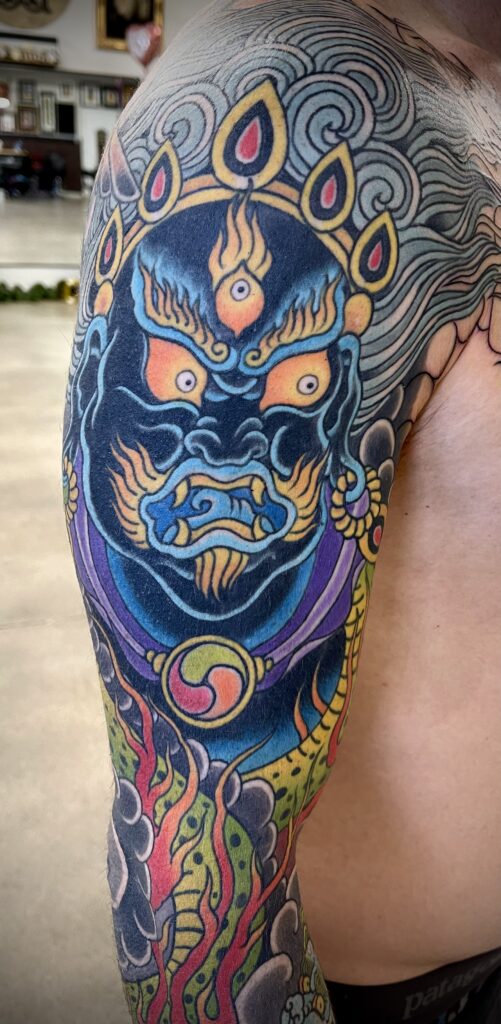 Vajrapani Hindu tattoo snake sleeve fire bright color