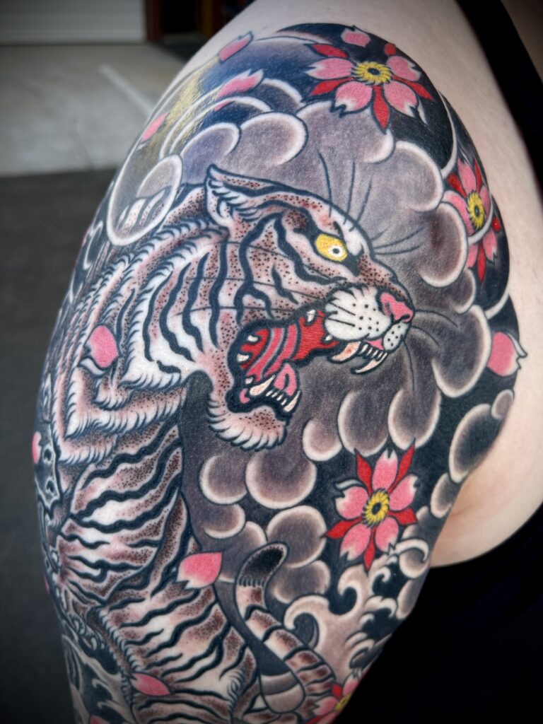 Traditional Japanese tiger tattoo dot work black and gray